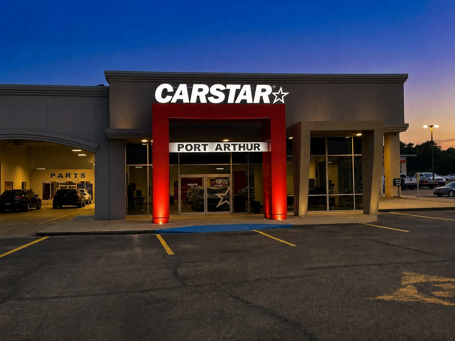 The original CARSTAR Port Arthur location illuminated at dusk